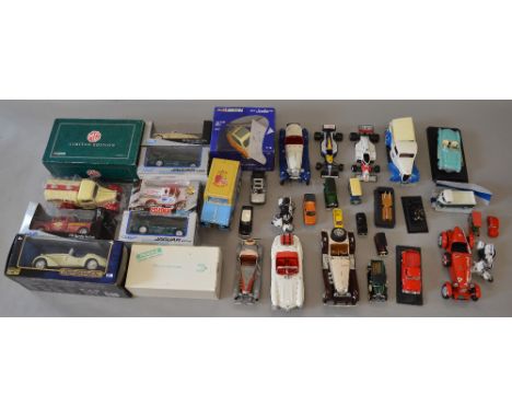 Quantity of larger scale diecast including Corgi, Burago and Evell, varying scales. Boxed and unboxed examples.