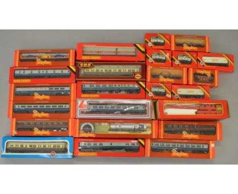 OO Gauge. 24 x assorted boxed rolling stock, Hornby, Lima, GMR. Includes 11 coaches, breakdown crane, operating mail coach & 