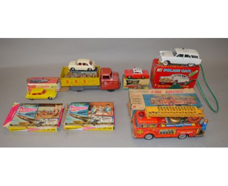 6 Tinplate/Plastic and friction models including a Marx Fire Engine etc together with 2 Waddingtons Thunderbirds jigsaws.