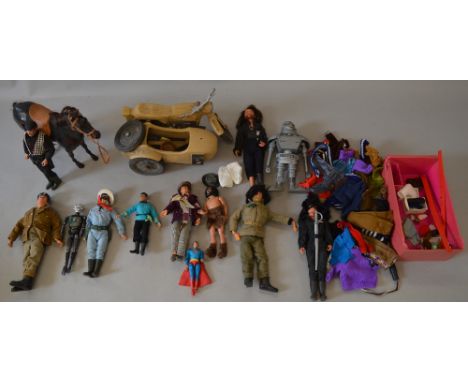 Collection of assorted action figures, accessories and vehicles, including Action Man examples.
