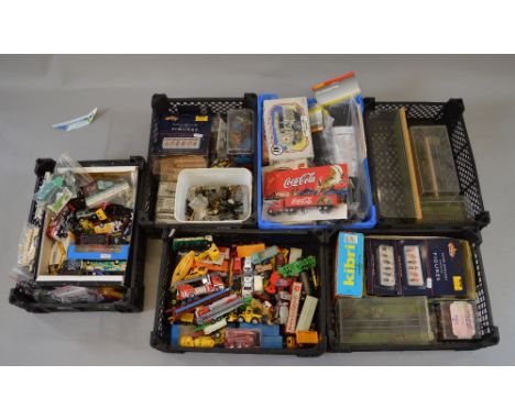 Ho Scale. Good quantity of vehicles & other associated accessories.
