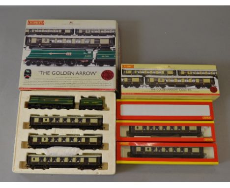 OO Gauge. Hornby. R. 2369 "The Golden Arrow" train pack together with R. 4196 "Golden Arrow" 3 coach pack.
