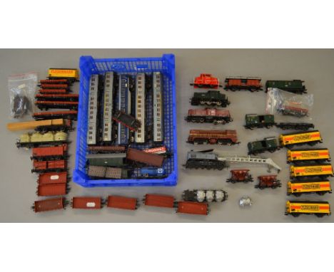 H0 Scale. Fleischmann & Roco. 4 x unboxed diesel locomotives(one bogie detached), together with 40 x assorted unboxed rolling