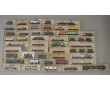 H0 Scale. Fleischmann. 44 x  assorted boxed rolling stock. Includes triple packs of hopper wagons.