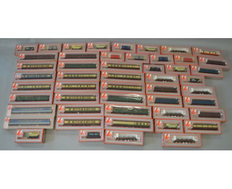 OO Gauge. Ex shop stock. Lima 20 x coaches together with 30 x rolling stock. (50)