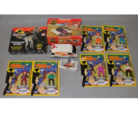 Mixed lot containing a vintage MASK Slingshot together with 6 Dick Tracey carded figures, Jurrasic Park Velociraptor and a Sc