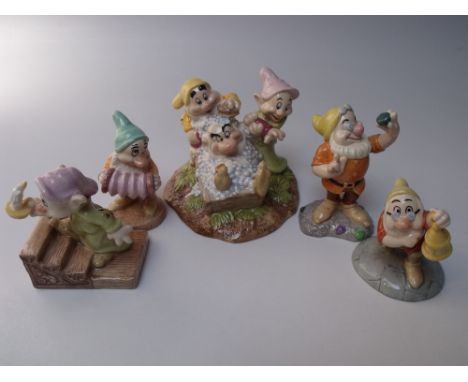 A ROYAL DOULTON WALT DISNEY'S SNOW WHITE LIMITED EDITION FIGURE 'GRUMPY'S BATHTIME' - MODEL SW20, together with a selection o