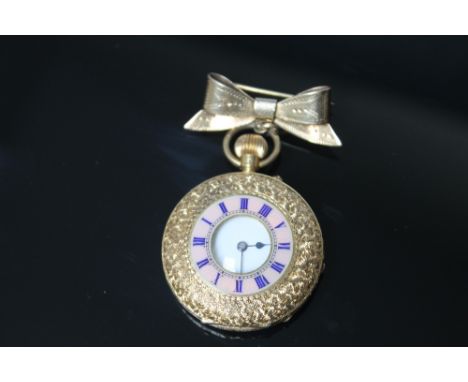 A HALLMARKED 18 CARAT YELLOW GOLD AND ENAMEL LADIES HALF HUNTER POCKET WATCH, having a pink enamel hour dial to front casing 