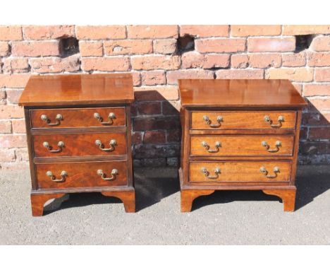 A SMALL MAHOGANY THREE DRAWER CHEST OF DRAWERS, with brass swan neck handles, raised on bracket feet, H 56 cm, W 49 cm, D 39 