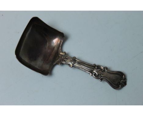 A GEORGE UNITE CADDY SPOON - BIRMINGHAM 1845, having shaped scroll stem and squared bowl, L 8.5 cm Buyers - for shipping pric