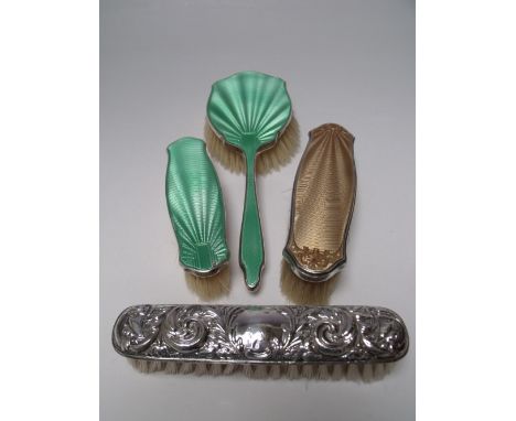 A SELECTION OF SILVER BACKED BRUSHES, various dates and makers, to include three guilloche enamel examples (4) Buyers - for s