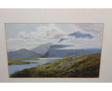 K. GILBERT (XX), 'Snowden, North Wales' and 'Isle of Skye', signed lower right, oil on board, framed and glazed, a pair, 14 x