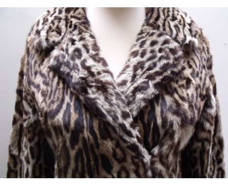 A STYLISH VINTAGE LADIES OCELOT FUR JACKET, fully lined, label reads 'S Jaffa Furs Ltd., specialist furriers, Belfast &amp; A
