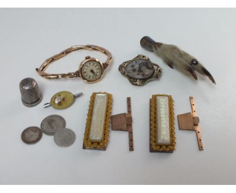 A SMALL TIN OF COSTUME JEWELLERY AND ACCESSORIES, to include an unusual pair of gilt metal and mother of pearl fabric / cloth