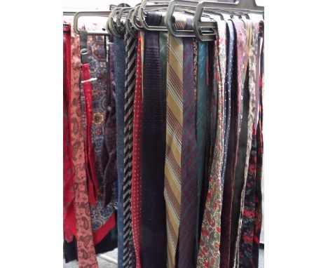 A LARGE COLLECTION OF GENTS VINTAGE TIES AND CRAVATS, to include examples by Christian Dior, Hardy Amies, Givenchy, YSL, Aust