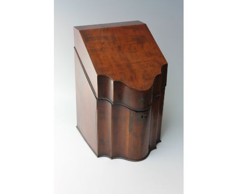 A 19TH CENTURY MAHOGANY SERPENTINE FRONTED KNIFE BOX, the hinged lid opening to reveal a starburst inlaid panel, the interior
