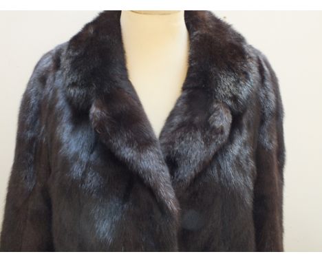A LADIES VINTAGE DARK CHOCOLATE BROWN MINK FUR JACKET, fully lined with internal pocket, maker's label for 'Faulkes of Edgbas