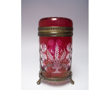 A BOHEMIAN RUBY GLASS BISCUIT BARREL / CANISTER, engraved and flashed cut decoration to clear glass, the hinged lid with gilt