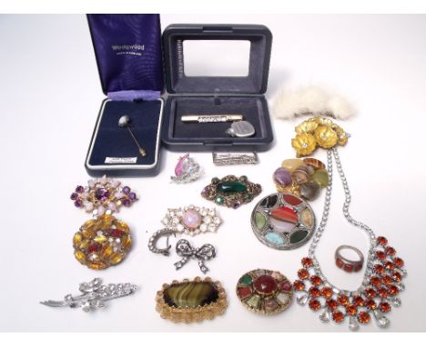 A COLLECTION OF VINTAGE COSTUME JEWELLERY, comprising mostly brooches, to include three silver and some signed examples etc. 