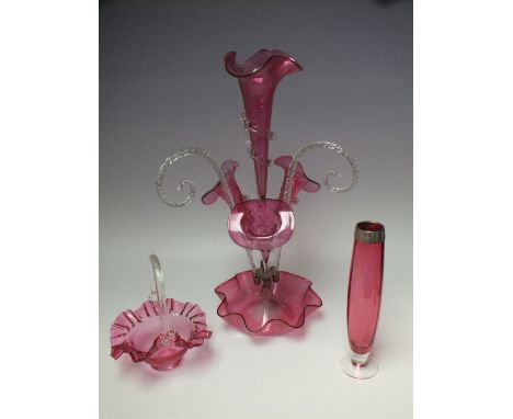 A VICTORIAN RUBY GLASS EPERGNE, with central trumpet, three side trumpets and three curved canes, H 52 cm, together with a si