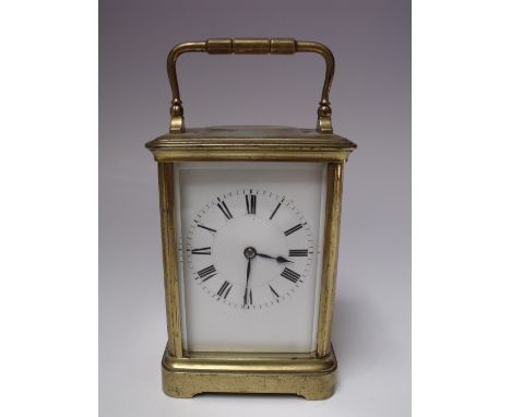 A FRENCH BRASS CASED CARRIAGE CLOCK BY HENRI JACOT, gilt brass cornice case, enamel dial with Roman numerals, maker's mark to