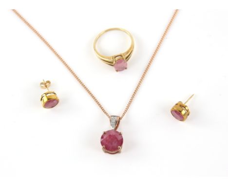 Ruby and diamond pendant, with a round cut ruby measuring 11.19mm diameter, in a four claw setting, suspended from a diamond 