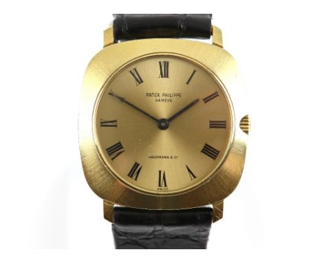 Patek Philippe, A gentleman's reference 3543, 18 ct gold manual wind cushion form wristwatch, the signed sunburst  champagne 