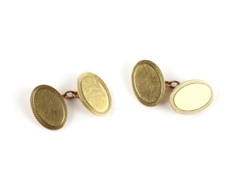 A pair of gold cufflinks, oval panels with engine turned decorated borders, and chain link connectors, in 18 ct yellow gold h