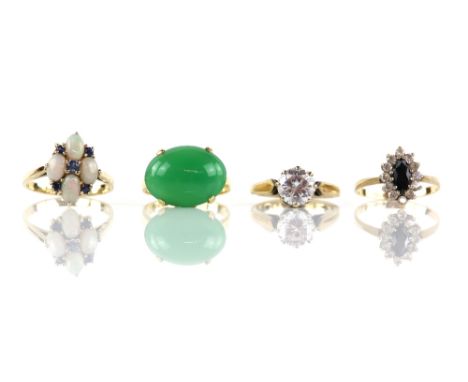 Four rings, one green quartz ring, mount stamped 18 ct, ring size P, another set with opal and sapphires, size Q, sapphire an