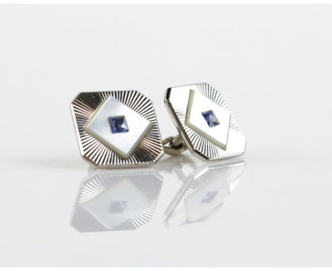 Art Deco style cufflinks, centrally set with square cut sapphires in a mother of pearl border, mounted in 9 ct white gold wit