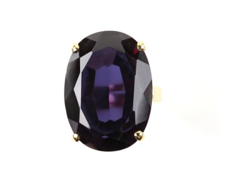 Single stone synthetic corundum ring, oval cut synthetic corundum measuring an estimated 22.5 x 16.4 x 9.6mm, in a four claw 