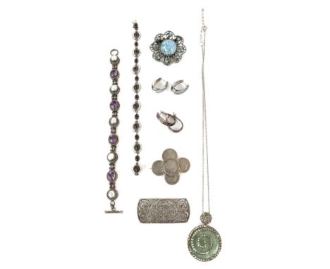 A group of costume jewellery, including a marcasite brooch, a marcasite and green hardstone necklace, three St Christopher pe