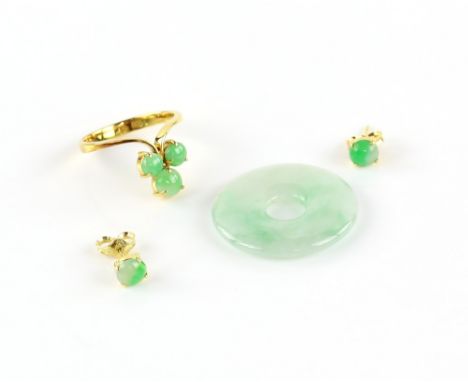 Jade trefoil ring, size M 1/2, and a pair of matching circular cabochon jade earrings with post and butterfly fittings, both 