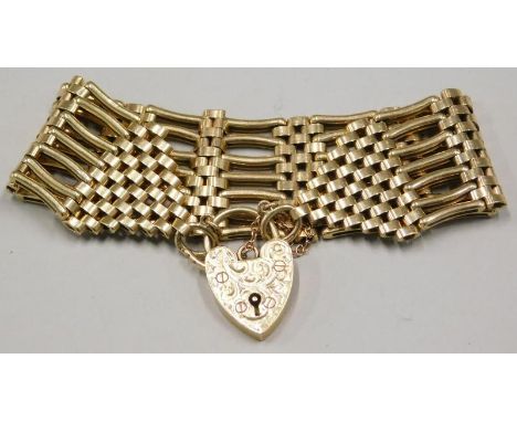 A 9ct gold gate bracelet, the padlock stamped 375, 42.1g
