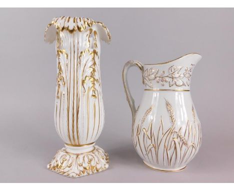 Two 19thC ceramic items, to include a Copeland and Garrett leaf moulded vase, decorated in gilt on a white ground, printed ma