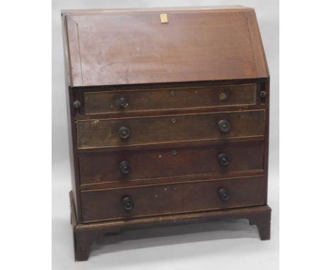 A 19thC oak bureau, the fall enclosing a fitted interior above four graduated drawers on bracket feet, 91cm wide