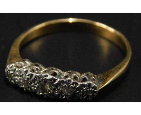 A five stone diamond dress ring, with five illusion set tiny diamonds, yellow metal, unmarked, 1.7g all in. 