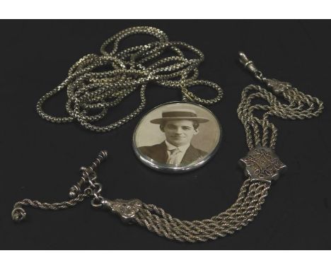 Two items of jewellery, to include a silver plated bracelet, and a portrait locket on chain (2). 