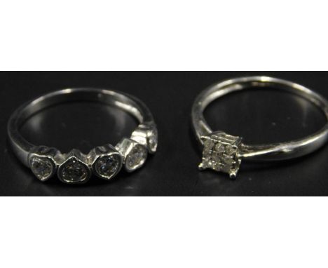 Two dress rings, to include a 9ct white gold dress ring, set with nine CZ stones, and a silver dress ring. 