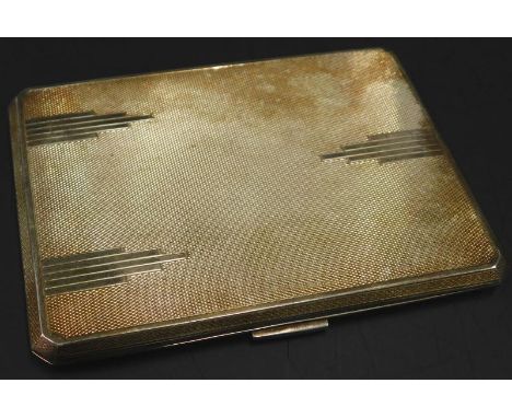 A George V silver Art Deco cigarette case, with engine turned decoration, personal inscription to the interior, Chester 1935,