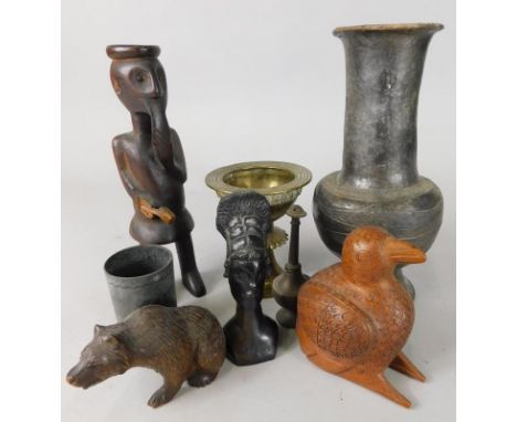 Miscellaneous items, to include a Black Forest seated bear, African figure of a man with a pipe, an African brass chalice typ