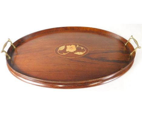 A mahogany oval galleried two handled tray, with central marquetry panel of a flower, 55cm wide.