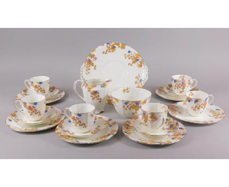 A Royal Doulton Carnival pattern part tea service, to include six cups, five saucers, six side plates etc.