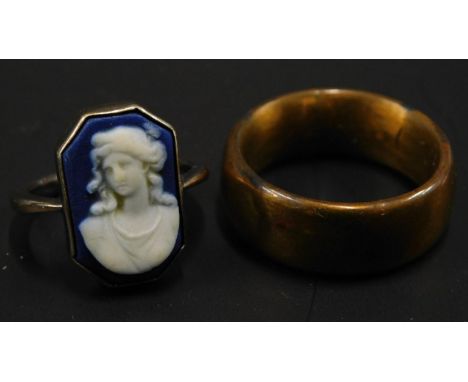 Two dress rings, to include a Wedgwood dress ring, and a plain wedding band, both gold plated. 