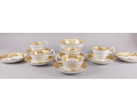 A mid 19thC English porcelain part tea service, decorated with flowers etc., on a beige ground