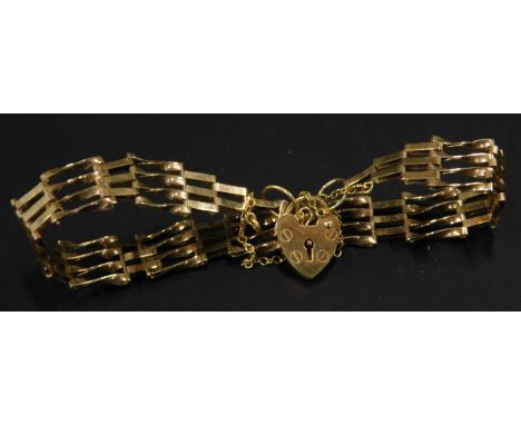 A 9ct gold gate bracelet, with four bar design, and padlock, 4.4g all in. 