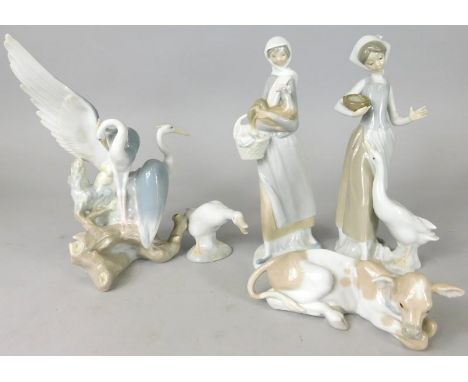 A collection of Lladro and Nao, to include figure of a girl with a cockerel, a girl with a goose, a recumbent calf, etc.