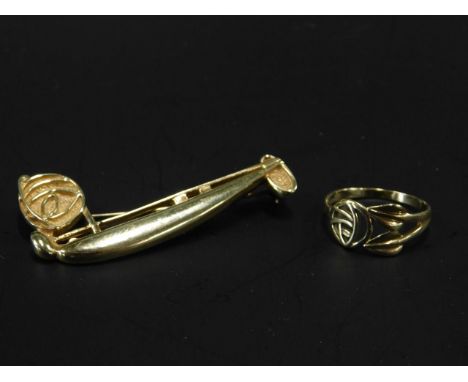 A Carrick Mackintosh style 9ct brooch, and a ring, 11.8g.