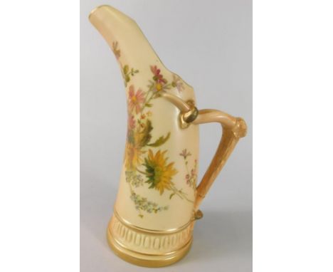 A Royal Worcester porcelain jug, painted with flowers on a blush ivory ground, the handle cast as an antler, printed mark in 