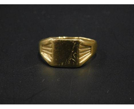 A 9ct gold signet ring, with a floral designed head, 3.8g. 